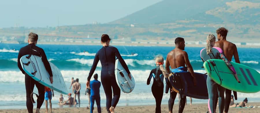 Agadir: 2h Surf Lesson with Local Instructors - Into the Atlantic with an instructor nearby