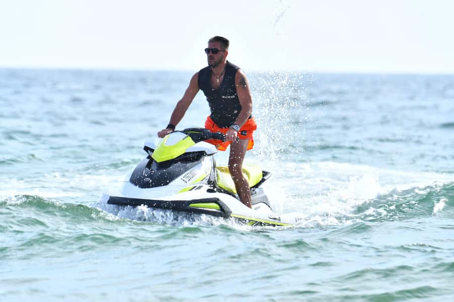 Agadir: Jet Ski Adventure W- Optional Quad Bike on The Beach - Taking a jet ski across Agadir Bay