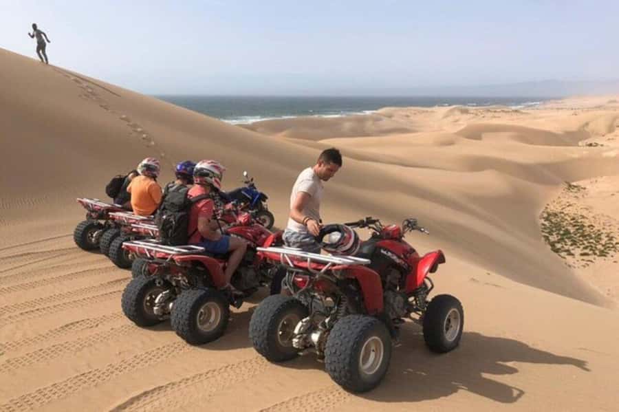 Agadir/Taghazout: Beach Quad Bike & Desert Sandboarding Tour - Sandboarding on golden dunes