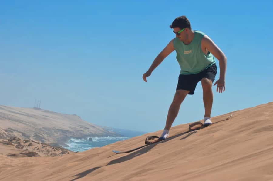 Agadir/Taghazout : Sandboarding & Sunset Camel Ride with BBQ - Sandboarding at the Timlaline Dunes