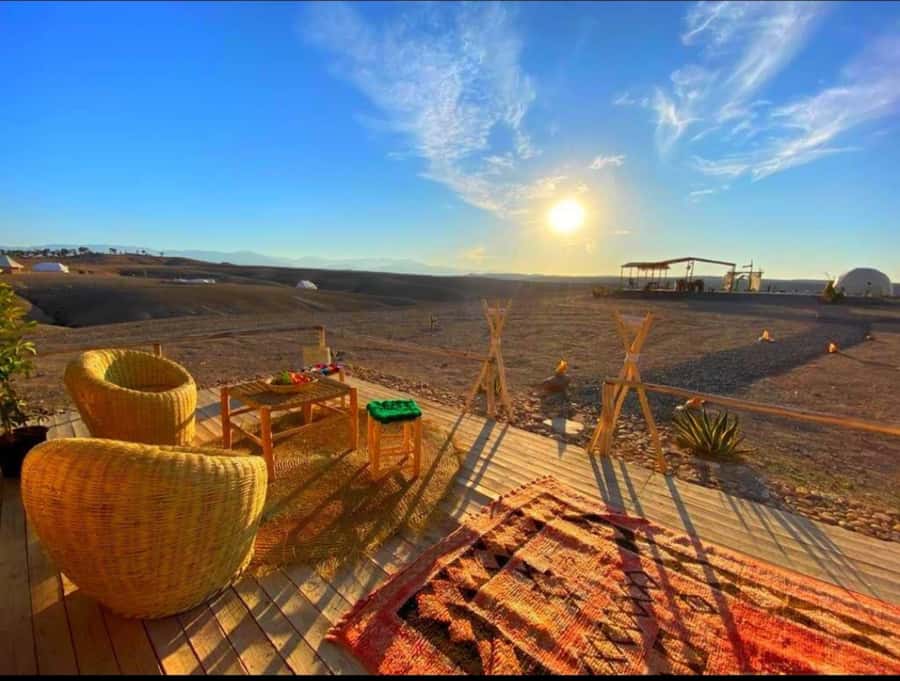 Agafay Desert: Magical Half-Day Lunch with Pool Swim - Arriving at a desert camp with a swimming pool