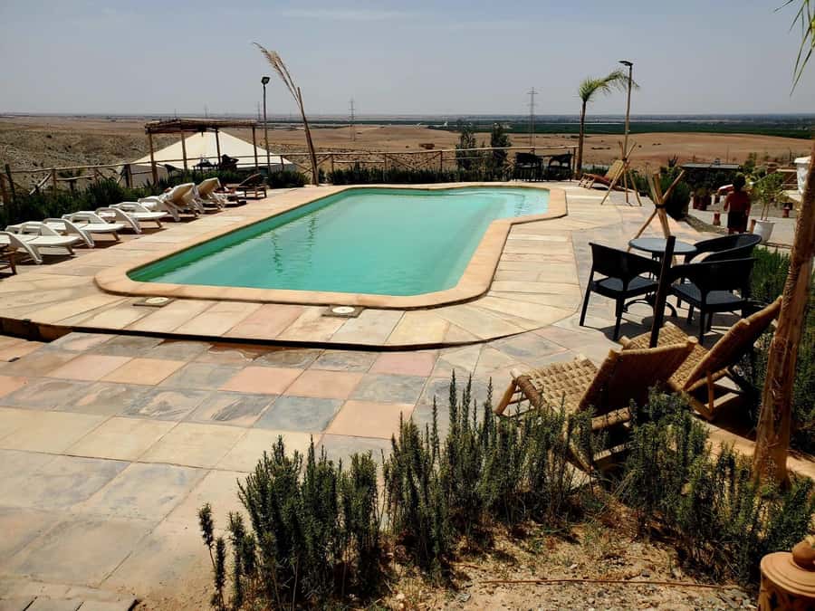 Agafay Desert Tour: Quad, Camel, Lunch & Pool Access - Leaving Marrakech for the rocky Agafay Desert