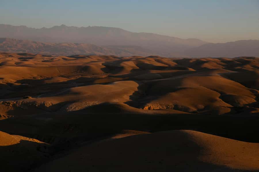 Agafay Tour: Sunset, Dinner, Camel ride, Quad and fire show - Sunset among Agafay’s white and ochre hills