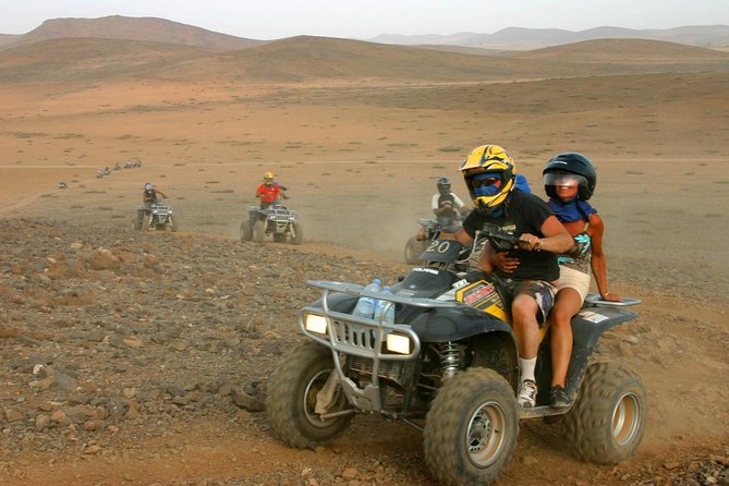 Desert D'Agafay Package - Quad, Dromedary and Dinner Show - Music, belly dancing, and fire performance