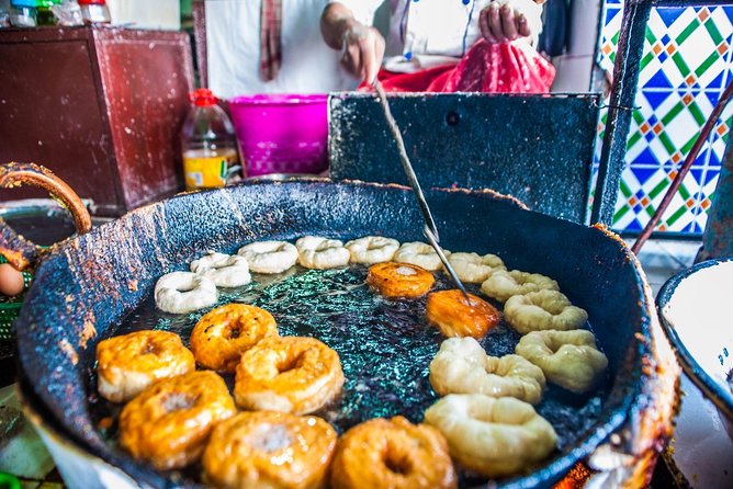 Evening Marrakech: Gastronomic and Market Tour Inside the Medina - Souk Semmarine brings the walking tour back into the medina