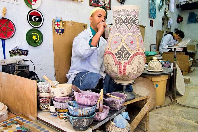 Fez Guided Tour of Artisans and Handicrafts Full-Day Private Tour - Bou Inania Madrasa and the art of Moroccan detail