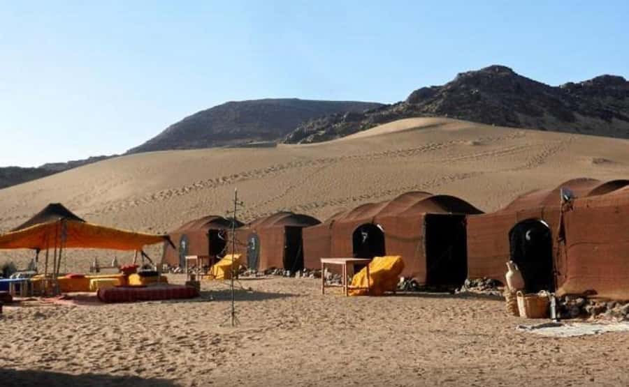 From Marrakech: 2-Days luxurious experience to Zagora Desert - The sunset camel ride into Zagora’s rocky desert