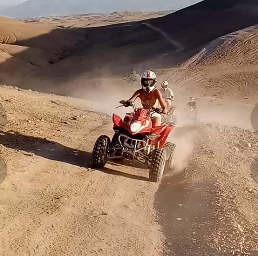 From Marrakech: Agafay Desert Quad Biking Tour with Transfer - Riding the high dunes with Atlas views