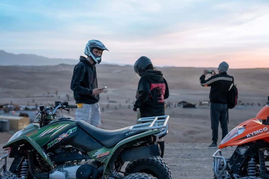 From Marrakech: Agafay Desert Quad Biking with Dinner & Show - Fire show and live music after sunset