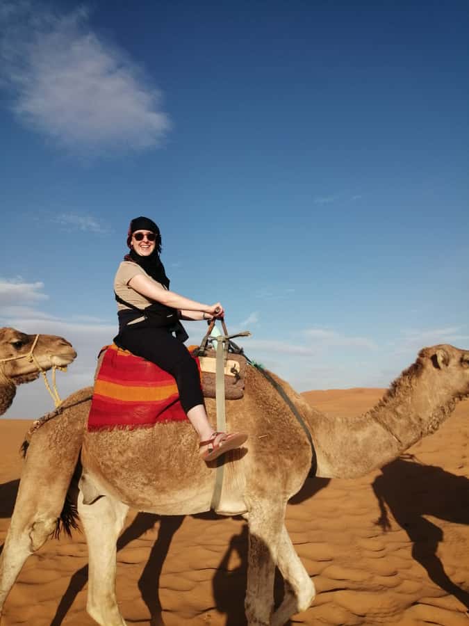 From Marrakech: Agafay Desert Sunset, Camel Ride, and Dinner - A camel ride along a Berber path