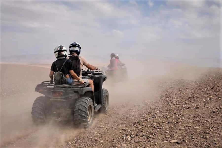 From Marrakech: Agafay Desert Sunset, Quad Biking, & Dinner - Moroccan dinner under candlelight