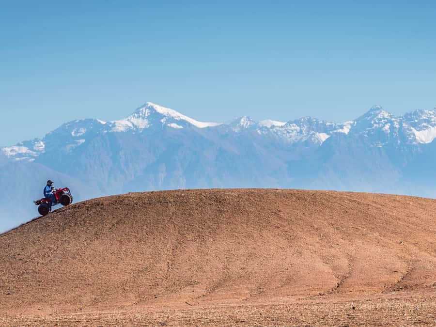 From Marrakech: Agafay Desert Sunset, Quad Biking, & Dinner - A cultural stop before the ride