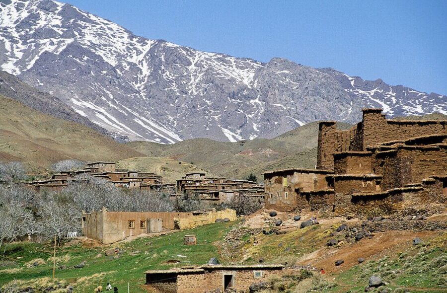 From Marrakech: Ourika Valley Tour with Lunch & Camel Ride - Walking through Ourika with a local guide
