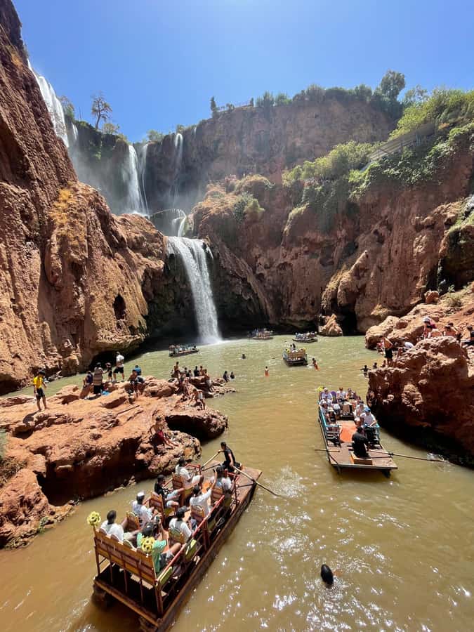 From Marrakech: Ouzoud Waterfalls Guided Hike and Boat Trip - The guided descent and orange juice viewpoint
