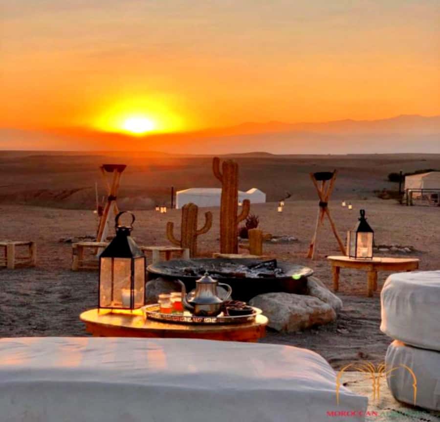 From Marrakesh Agafay Desert Dinner & Sunset, and Camel Ride - Berber music and the fire show