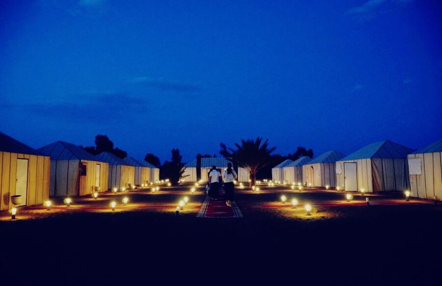 From Merzouga: Desert Overnight in Heated Tent & Camel Ride - Drums, firelight, and a quiet sky