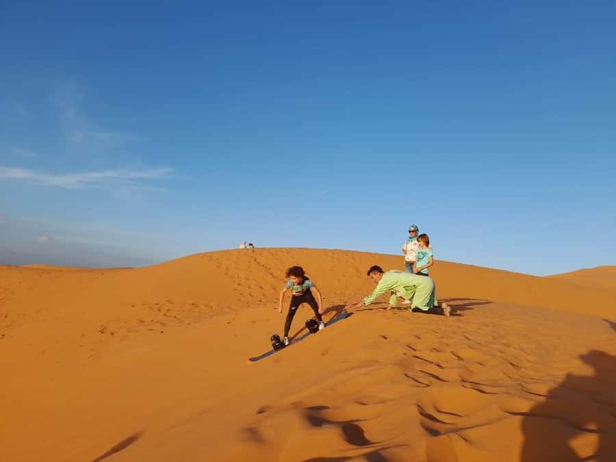 From Merzouga: Overnight Camel Trek over Erg Chebbi Dunes - Sunset, sandboarding, and time before dinner