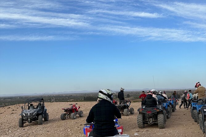 Full Package Agafay Desert, Quad Bike, Camel Ride and Dinner show - Quad biking through the Agafay Desert