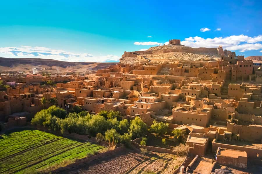 Marrakech: 3-Day Merzouga Desert Tour Camel & Sandboarding - Walking through Todra Gorges