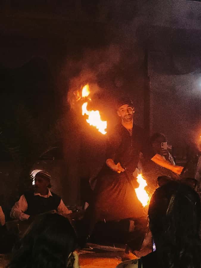 Marrakech: Agafay Camel Ride & Dinner with Fire Show Tour - Moroccan dinner, mint tea, and music