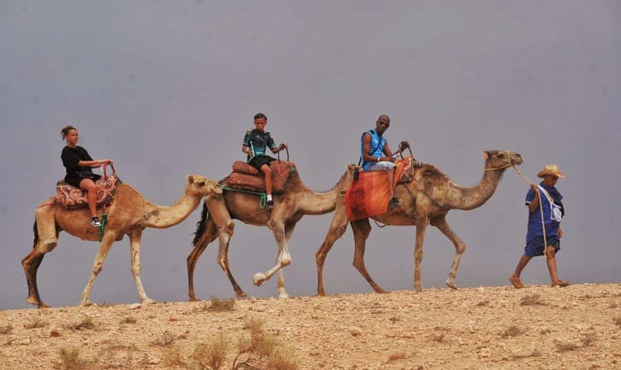 Marrakech Agafay desert: Camel Ride, Sunset, Dinner show - Camp tea, lanterns, and the change from day to night