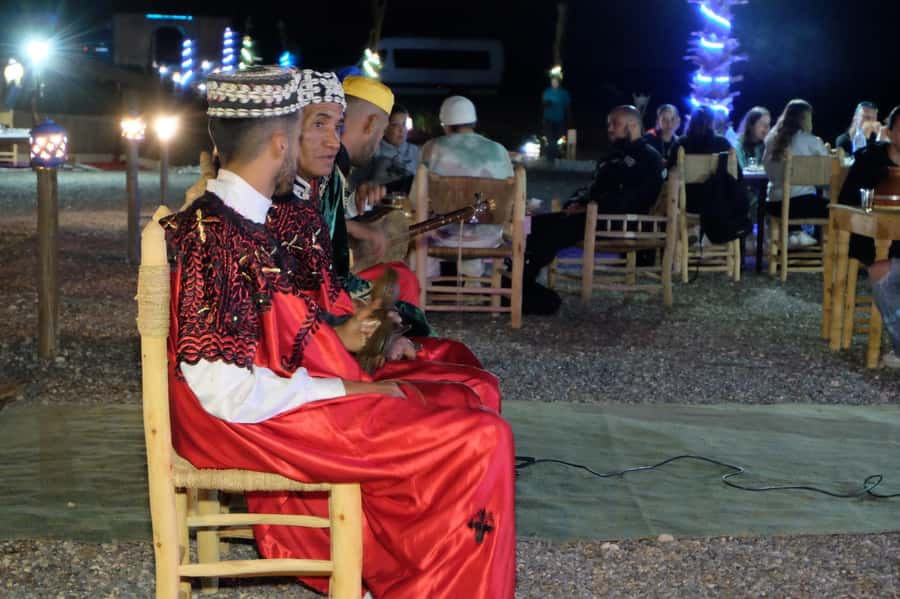 Marrakech: Agafay Desert Dinner Show with Sunset Camel Ride - Dinner under the tent canopy