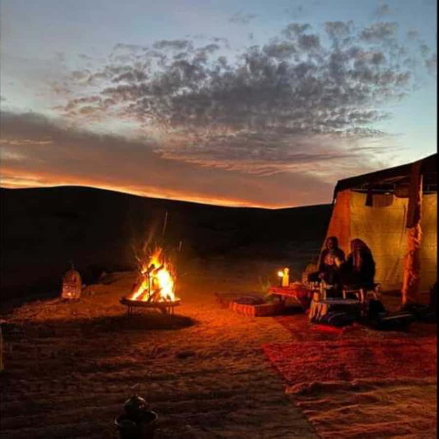 Marrakech: Agafay Desert Dinner with Music and Fire Show - Transport, guides, and group size