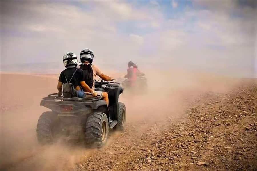 Marrakech: Agafay Desert Quad Biking, Camel Ride Fire Show - Quad biking across the Agafay trails