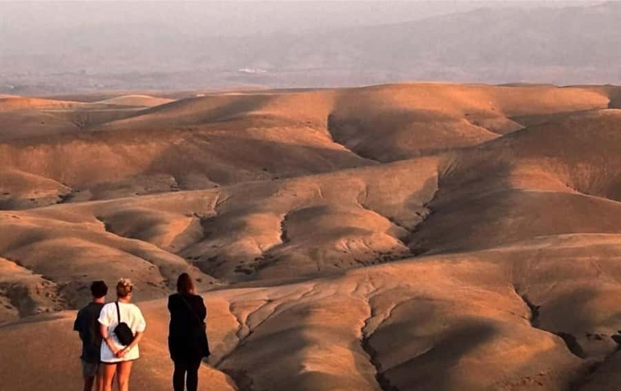 Marrakech : Agafay Desert Sunset Camel Ride & Luxury Dinner - Gnawa music, dancing, and the live fire show