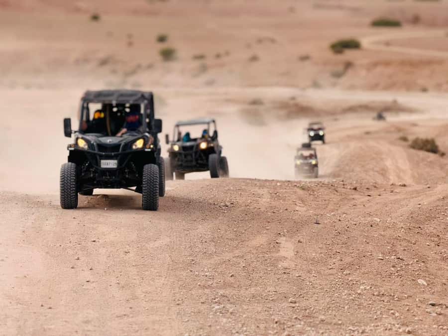 Marrakech: Agafay Dinner Show, Camel Ride, Quad, or Buggy - Dust, head wraps, and practical riding advice