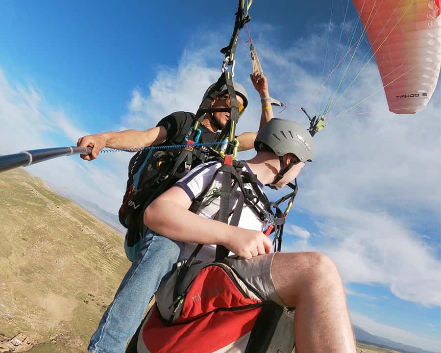 Marrakech: Atlas Mountains Paragliding Tour with Video - Getting ready on the takeoff site
