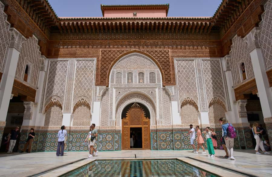 Marrakech: Ben Youssef Guided Tour with Skip-the-Line Entry - Starting at Jemaa el-Fna and entering the souks