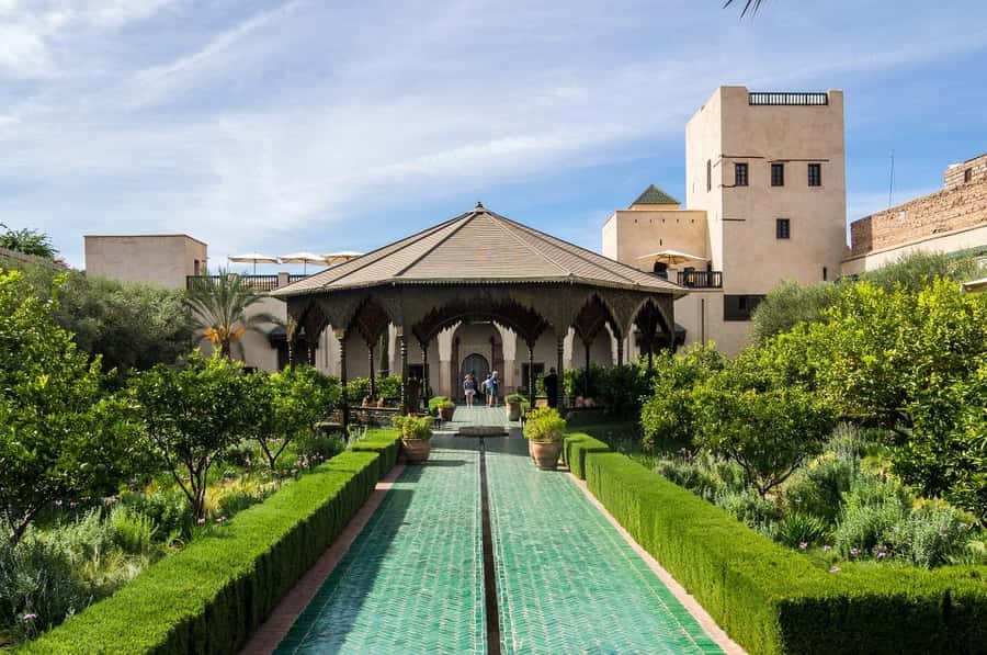 Marrakech: Ben Youssef, Secret Garden, & Souks Walking Tour - Ben Youssef Madrasa and its quiet courtyard