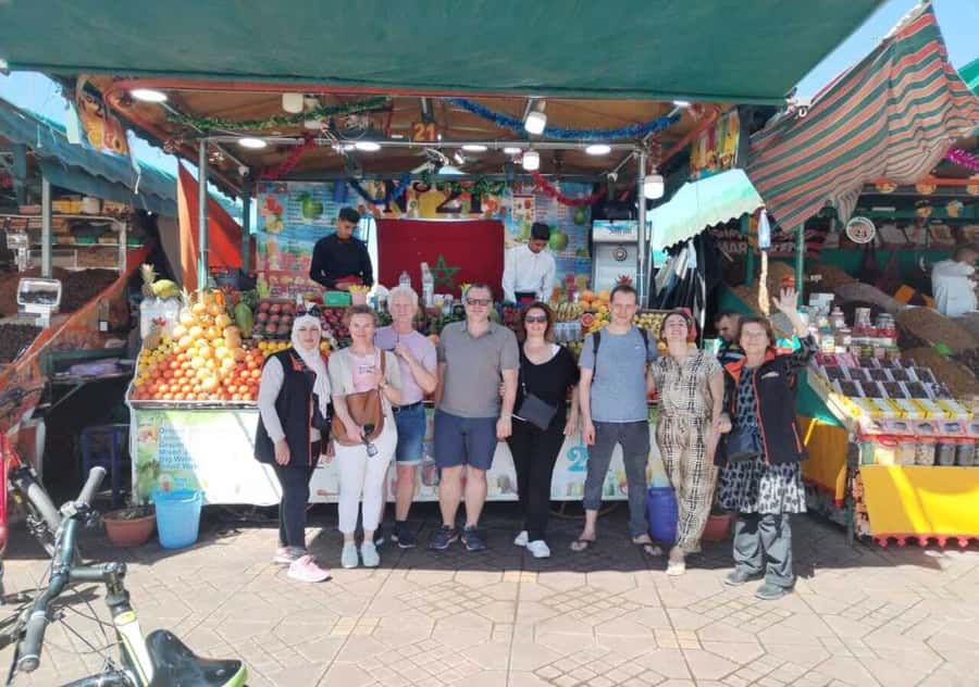 Marrakech: Bicycle Tour with a Local Guide - City walls, practical local stops, and guide quality