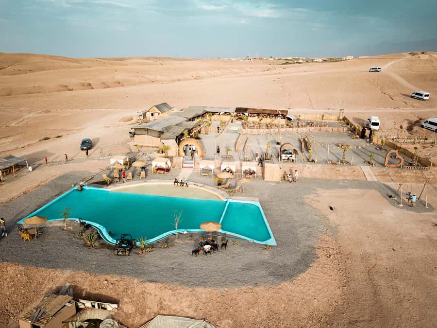 Marrakech: Camel Ride, Dinner, Pool, and Fire Show in Agafay - Tea, pool time, and the desert camp