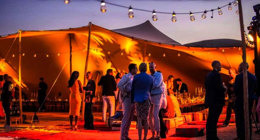 Marrakech: Camel Ride, Dinner, Pool, and Fire Show in Agafay - Moroccan dinner under the stars