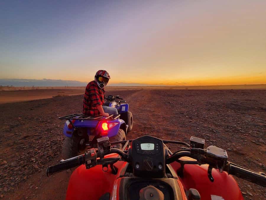 Marrakech: Desert and Palm Grove Sunset Quad Tour with Tea - Getting started: helmets, practice, and safety