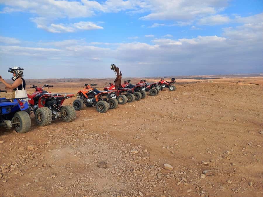 Marrakech: Desert and Palm Grove Sunset Quad Tour with Tea - Two hours across palms, tracks, and rocky desert