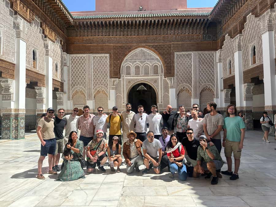 Marrakech: Madrasa Ben Youssef, Secret Garden & Medina Tour - Through the souks, workshops, and spice quarter
