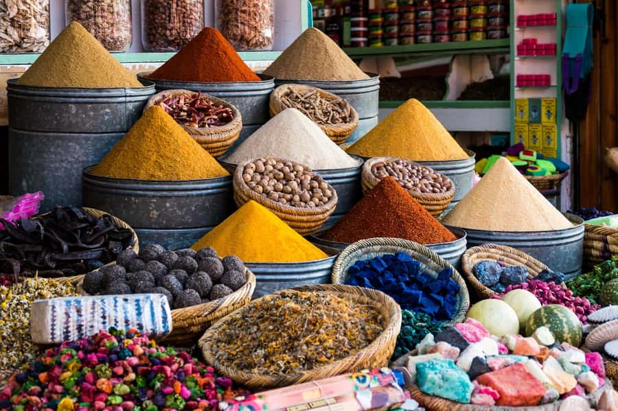 Marrakech: Medina, Souks, Artisans Guided Tour with Mint Tea - Through the Medina’s narrow lanes