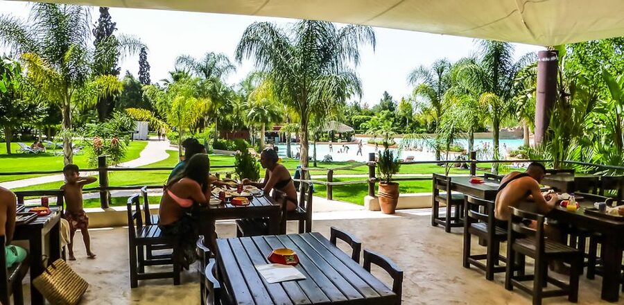 Marrakech: Oasiria Water Park Entrance Ticket - Gardens, shade, and cabana value