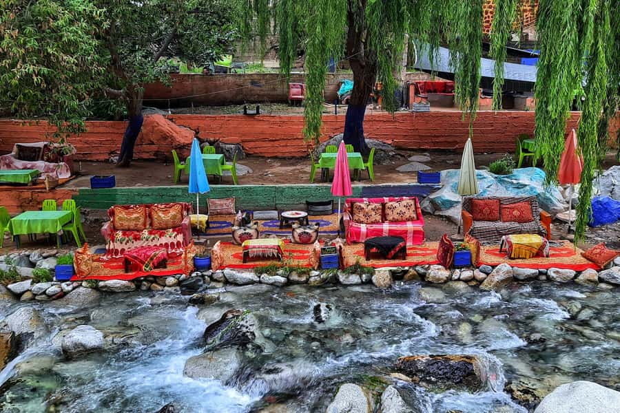 Marrakech: Ourika Valley and Atlas Mountains Day Trip - A riverside lunch with a few conditions