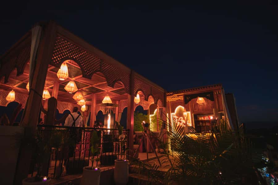 Marrakech: Rooftop Dinner with Koutoubia View - Sunset, monuments, and the open rooftop view