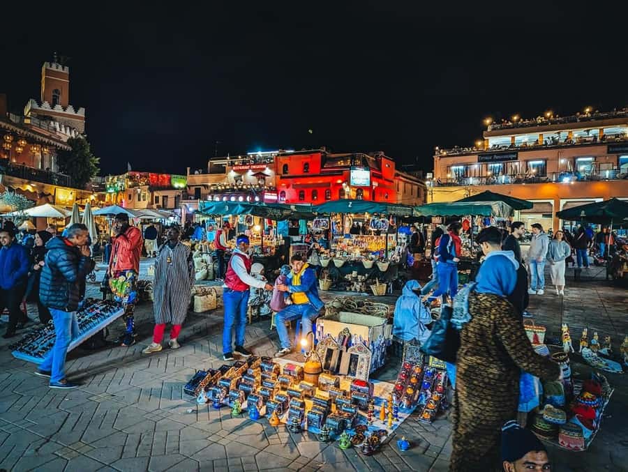 Marrakech: Souk by Night Medina Guided Walking Tour. - Tasting olives, fruit, tea, and local snacks