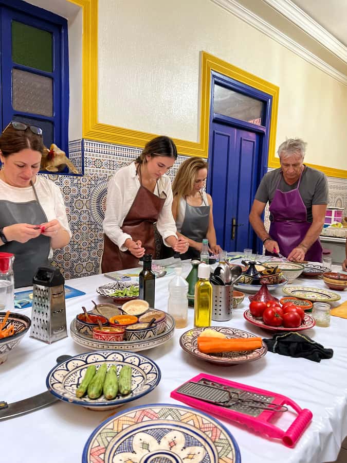 Marrakech: Traditional Moroccan Cooking Class & Market Visit - Cooking several dishes as a team