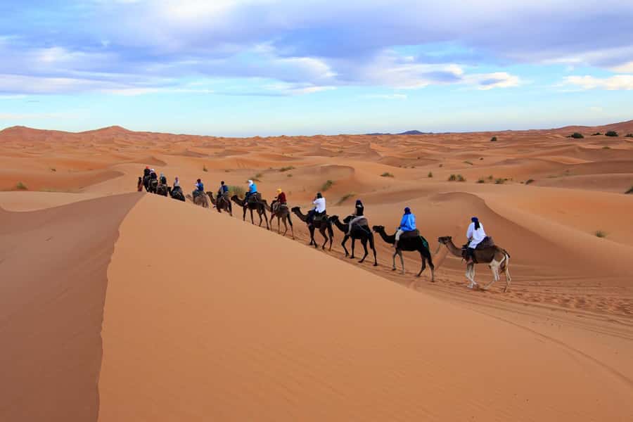 Merzouga: 1-Night in Desert Camp With Dinner & camel ride - Arriving at camp with tea and a warm welcome