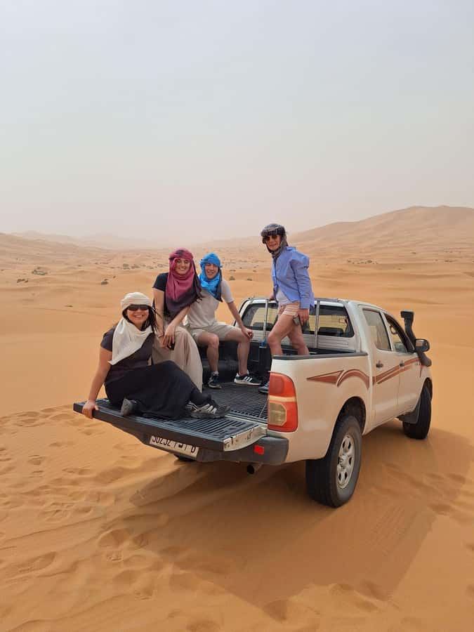 Merzouga: Overnight Stay in Luxury Desert Tent with Dinner - Moroccan dinner, tea, and a night by the fire