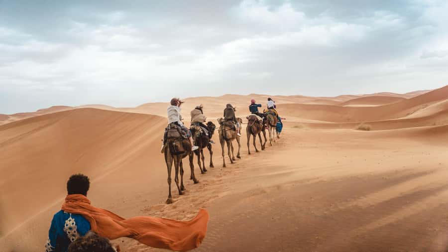 Merzouga: Overnight Stay in Luxury Desert Tent with Dinner - The camel ride and sunset stop