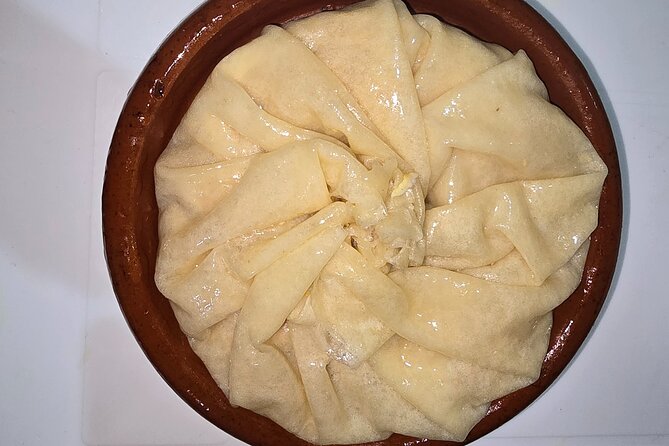 Moroccan Cooking Class and Fez Market Visit and Meal - Sitting down to the Moroccan meal