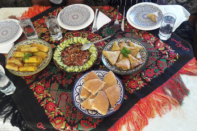 Moroccan Cooking Class & Marrakech Market Visit with Chef Khmisa - Walking through the less-touristed souk